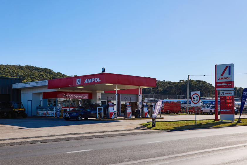A photo of a red and white Ampol petrol station in Tasmania