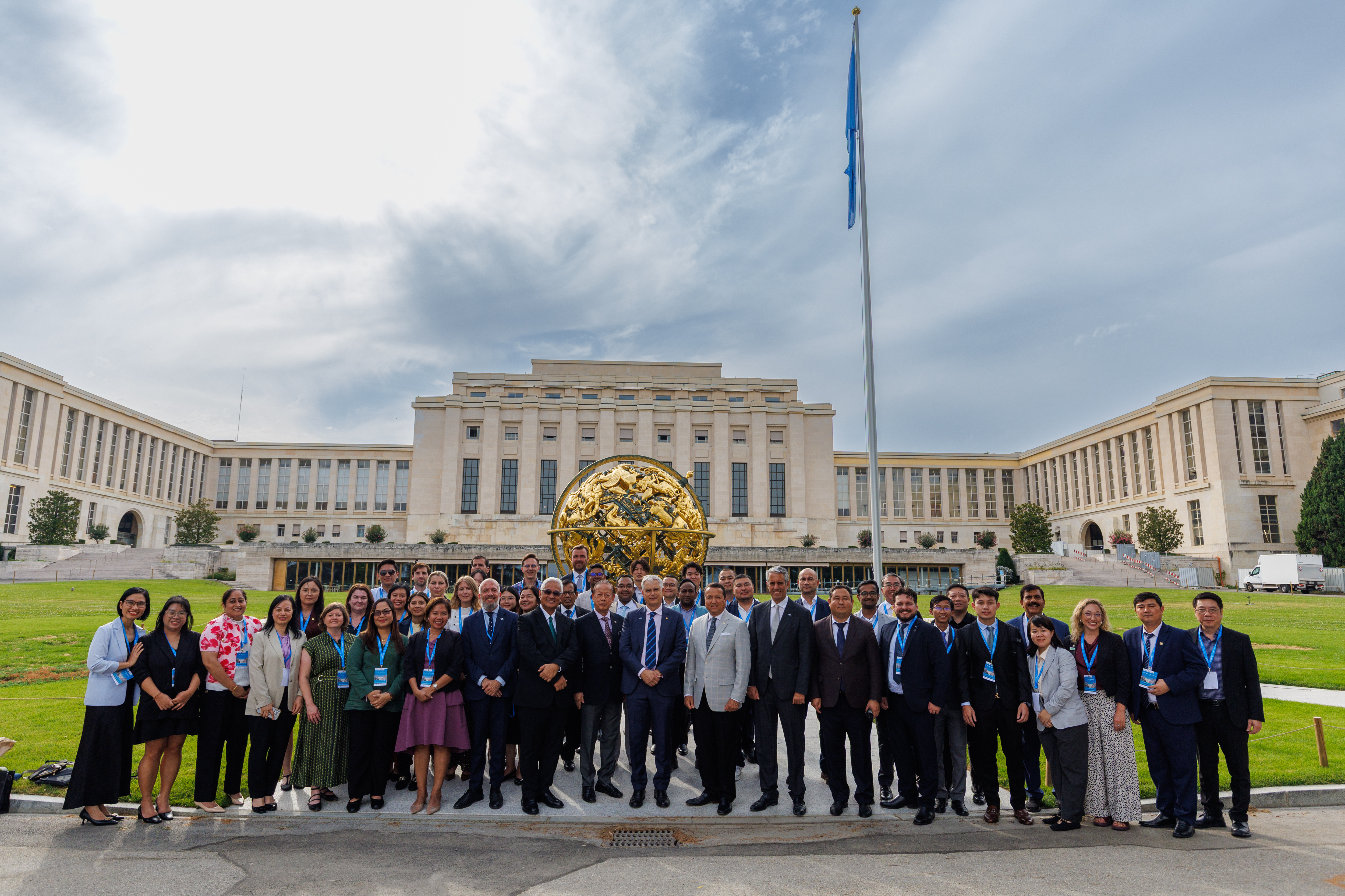 A group of people in front of building in Geneva