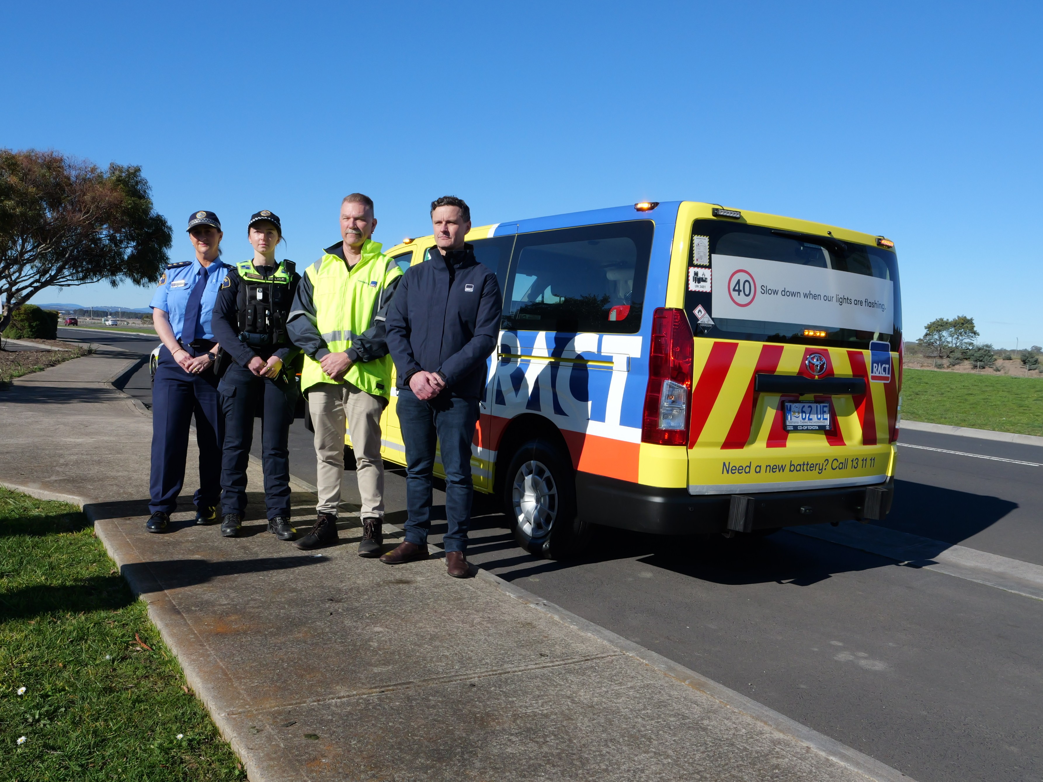 RACT and Tas Police representatives in front of RACT van