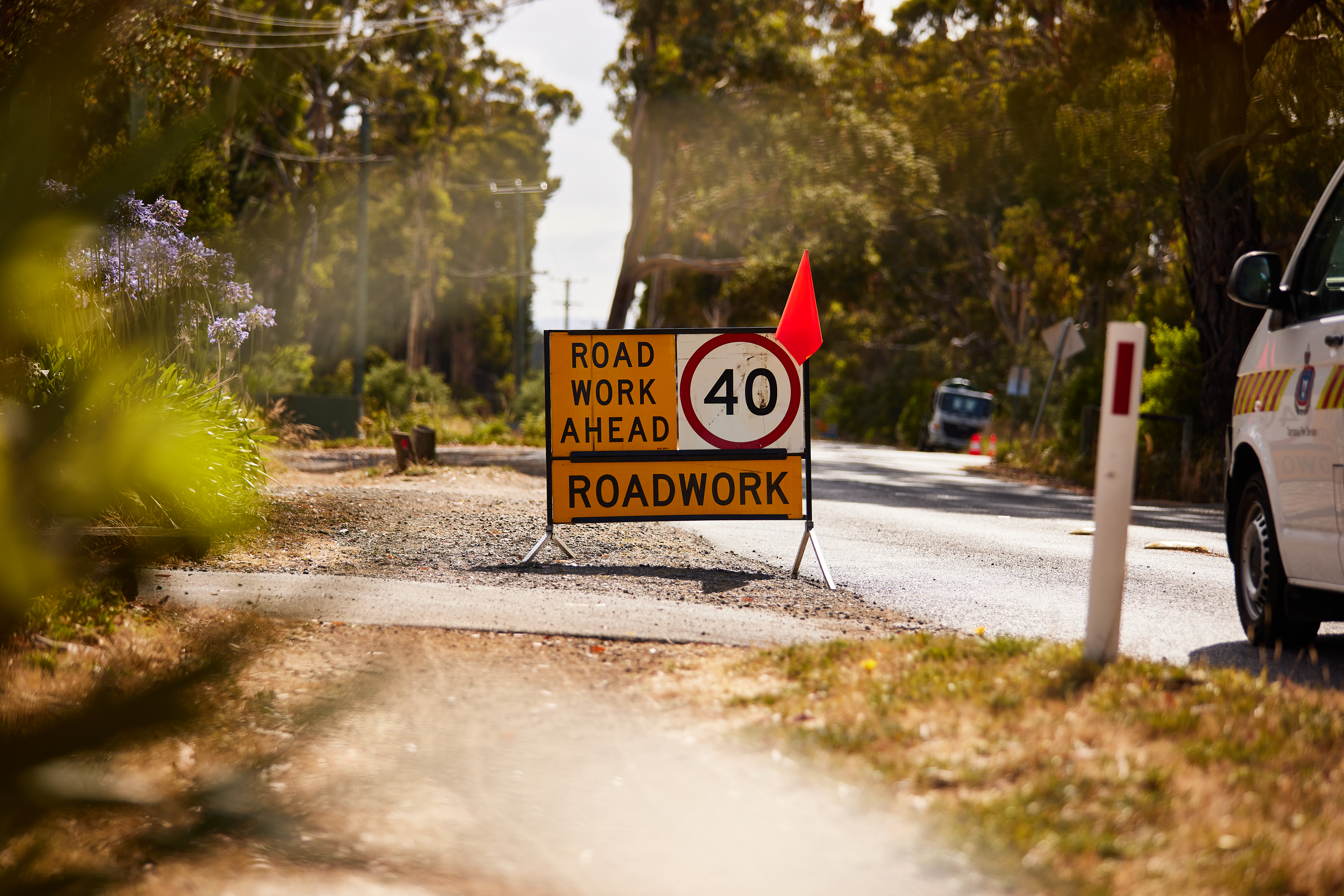 40 kph road sign with road works ahead