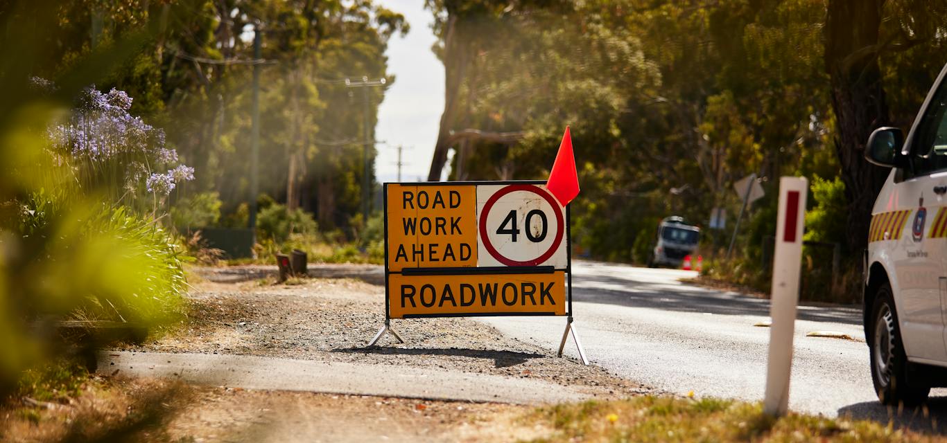 40 kph road sign 40 kph road sign with road works ahead