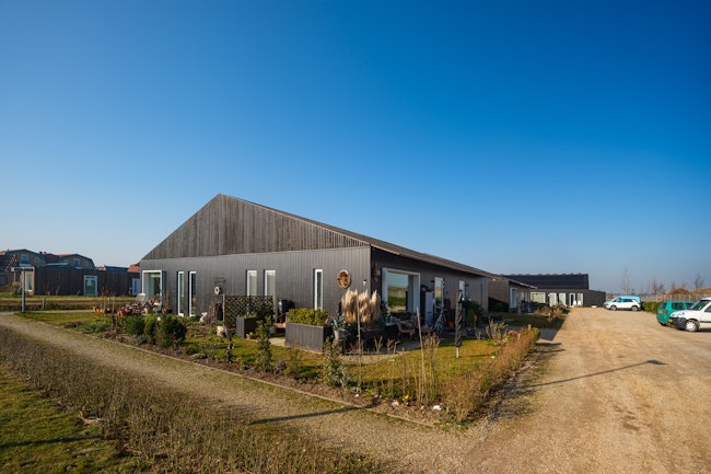 Woonproject de Tuunen Woontij Texel — prefab houtbouw project van Skilpod