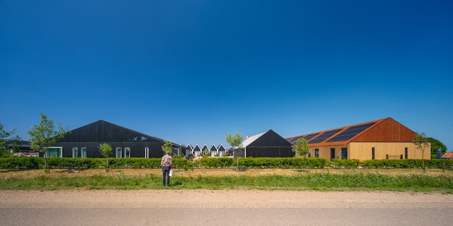 Woonproject de Tuunen Woontij Texel — prefab houtbouw project van Skilpod