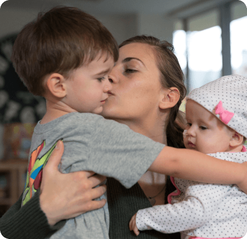Happy mother with two kids