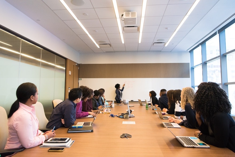 Large meeting with presentation