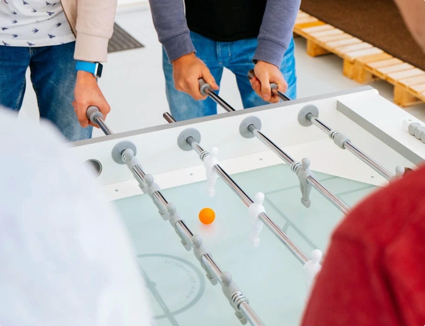 Playing foosball with the team.