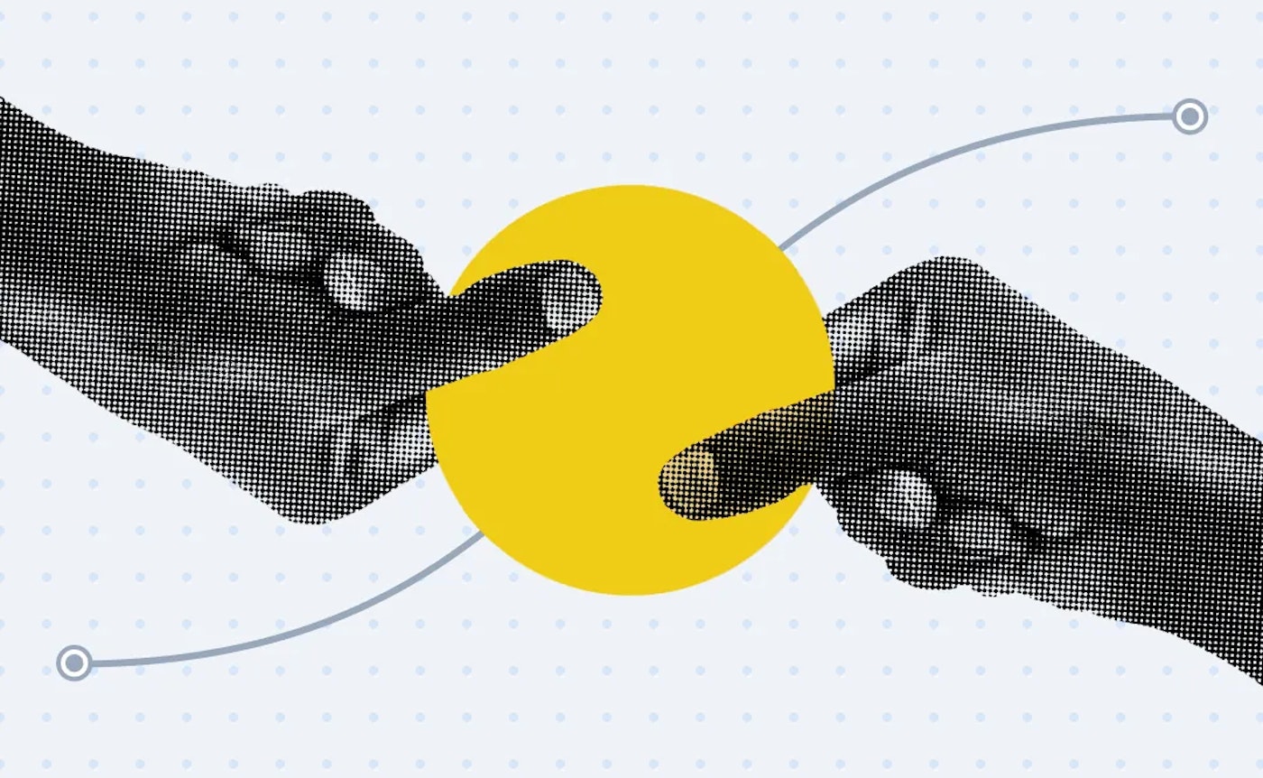 Two hands holding a yellow circle