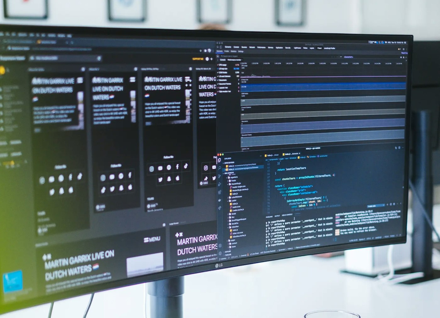 Monitor showing Martin Garrix website in multiple breakpoints with a code editor beside it