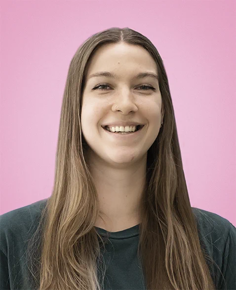 Portrait of Micky Puck against pink background