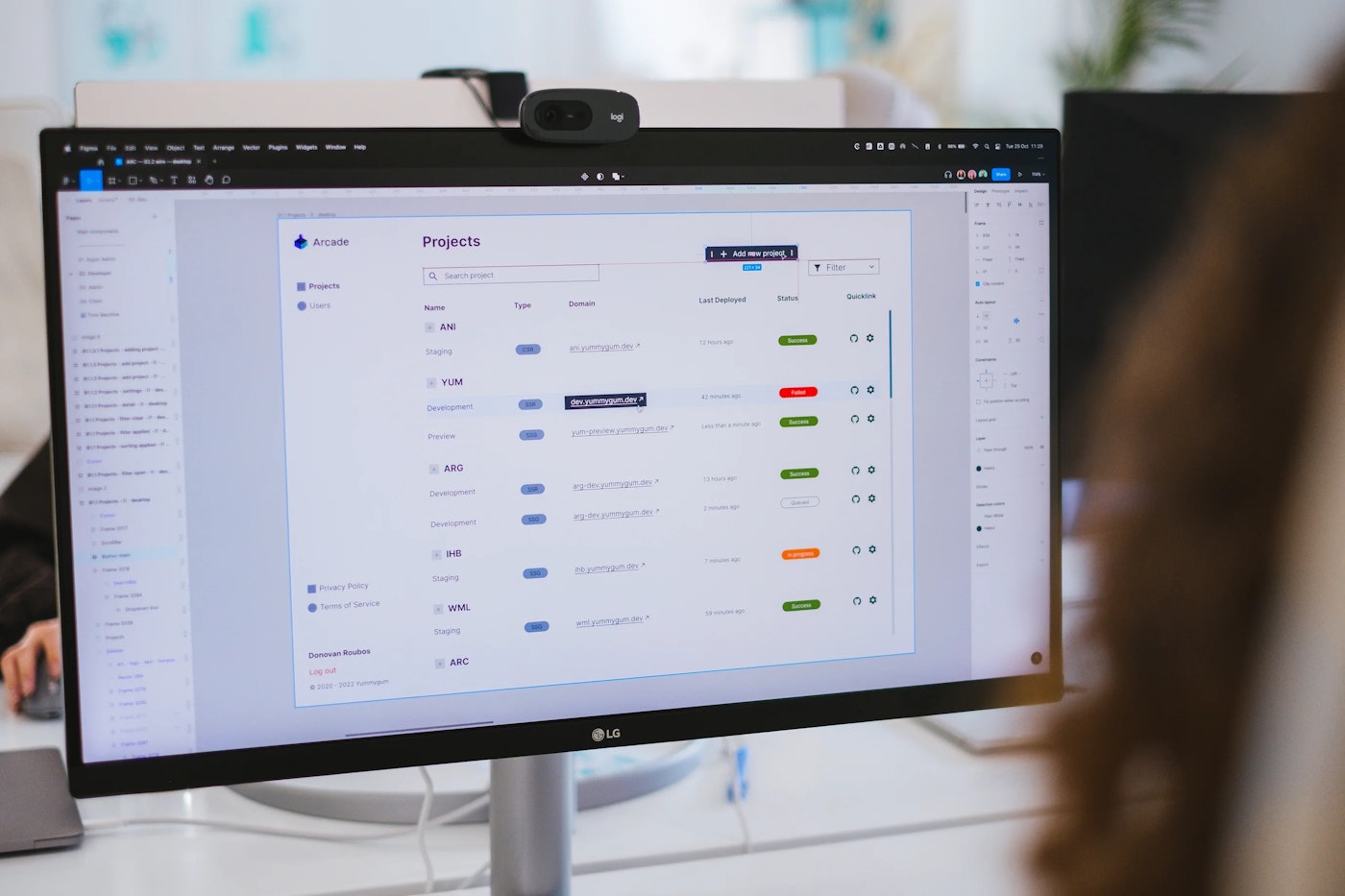 Monitor showing design tool Figma with a high fidelity wireframe of a tabular user interface