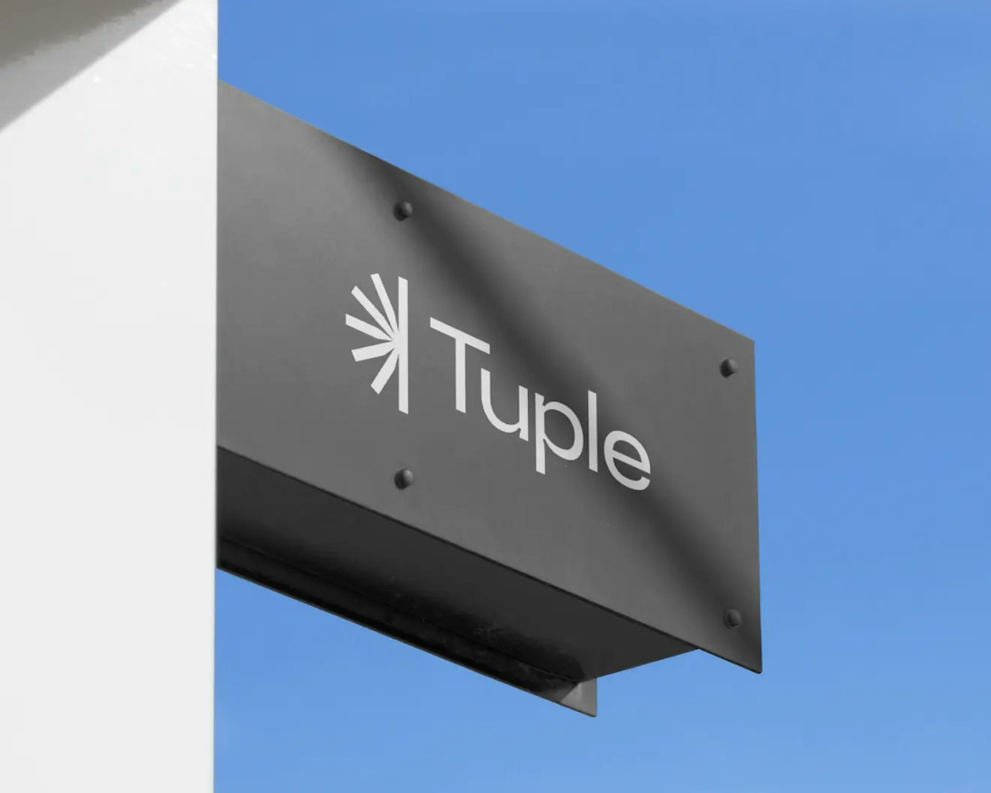 Image of a dark signboard with the new Tuple logo on it