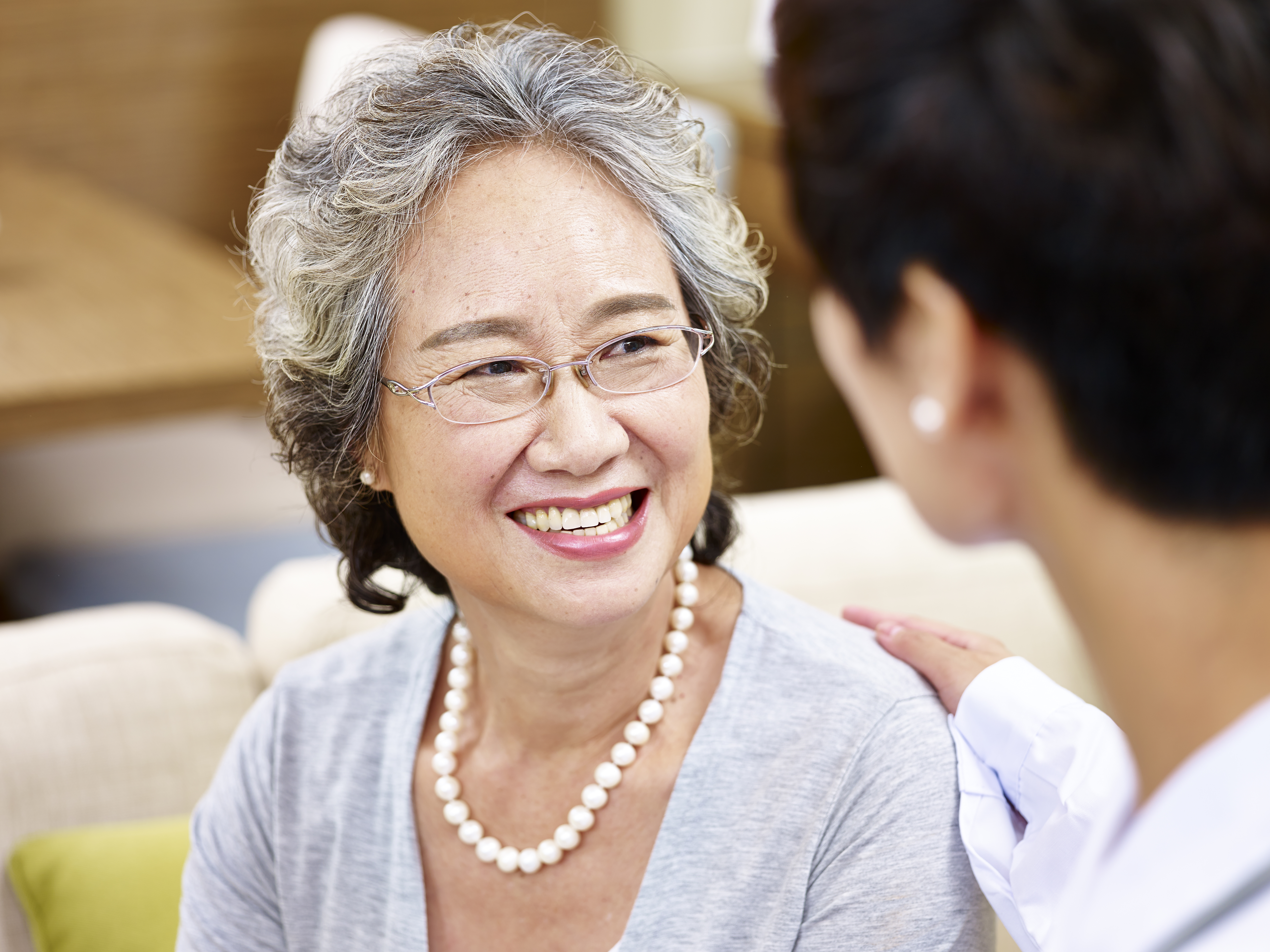 Smiling woman enjoys worshipping with good IAQ