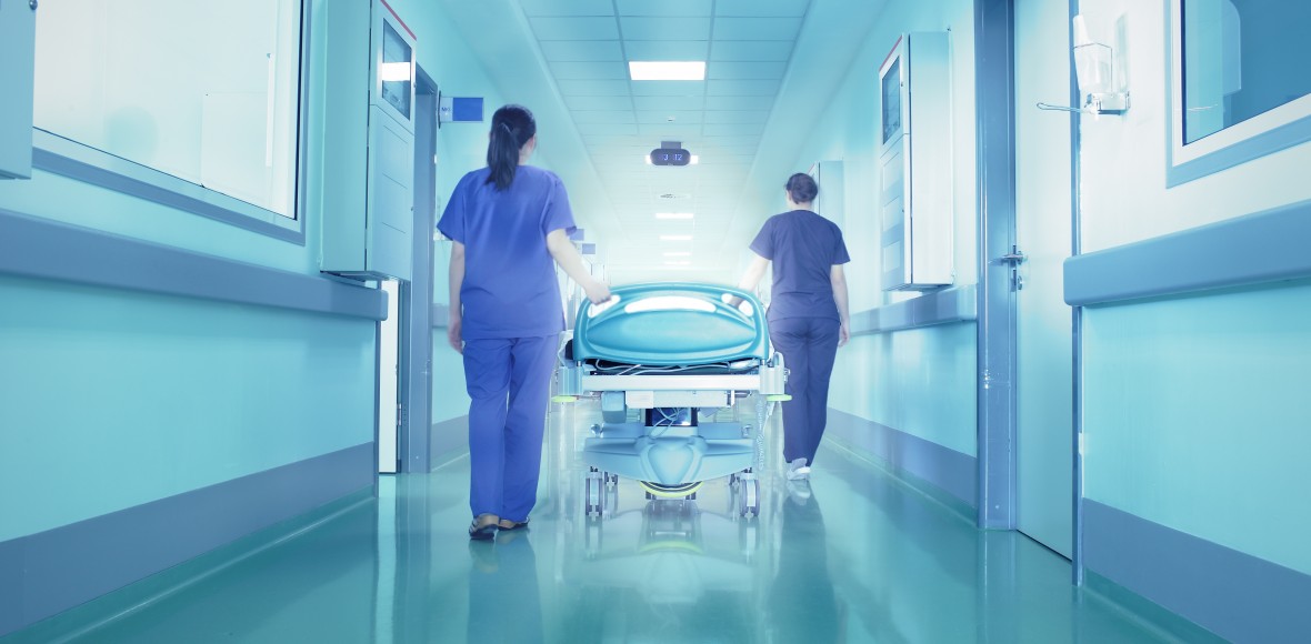 hospital workers with gurney