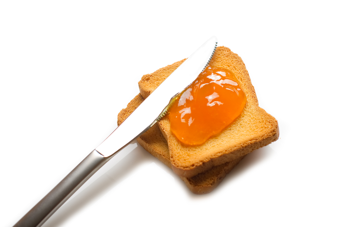 Spreading jam on toast