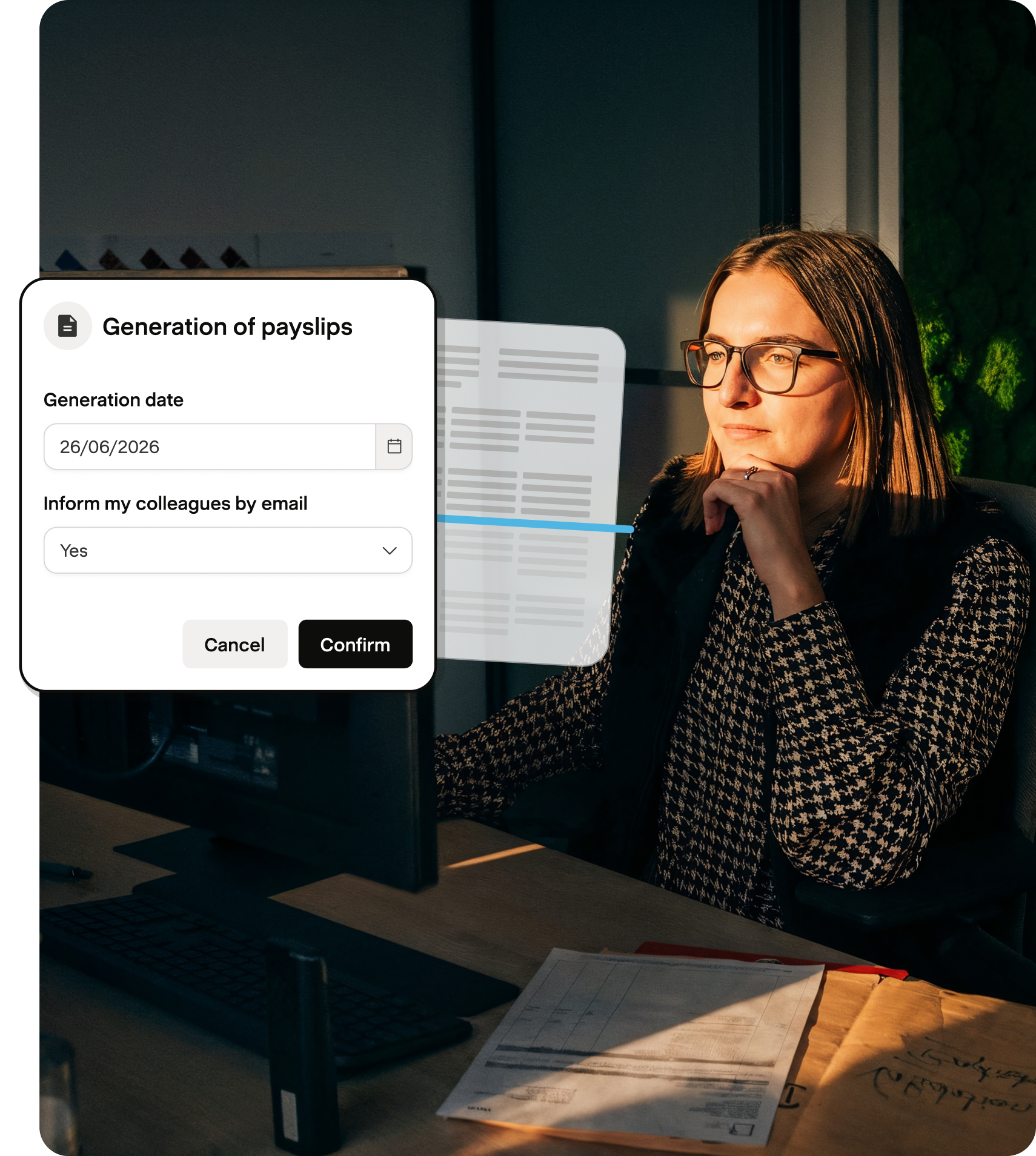 Payroll manager at her desk generating payslips in Payfit
