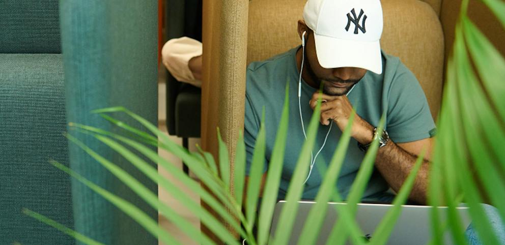 A new employee working on a laptop