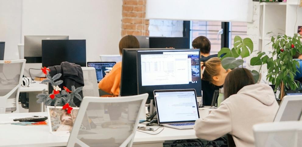 A team working together in an open-plan office