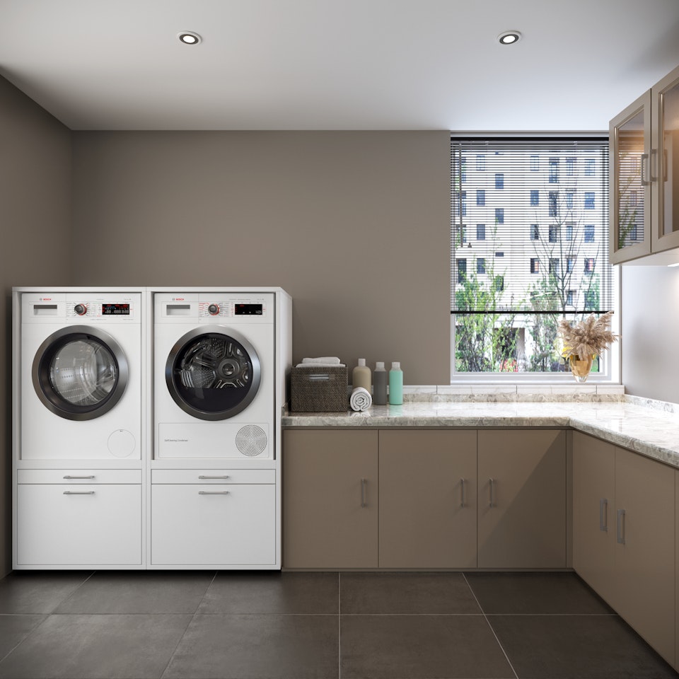 Waschküche Möbel, bestehend aus zwei weißen Waschmaschinenschränken nebeneinander ohne Überbauschrank.