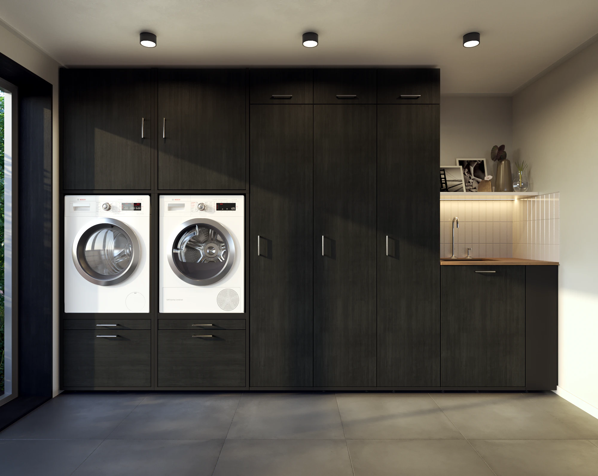 Lifestyle all black washing machine and dryer triple tall cupboard in scullery