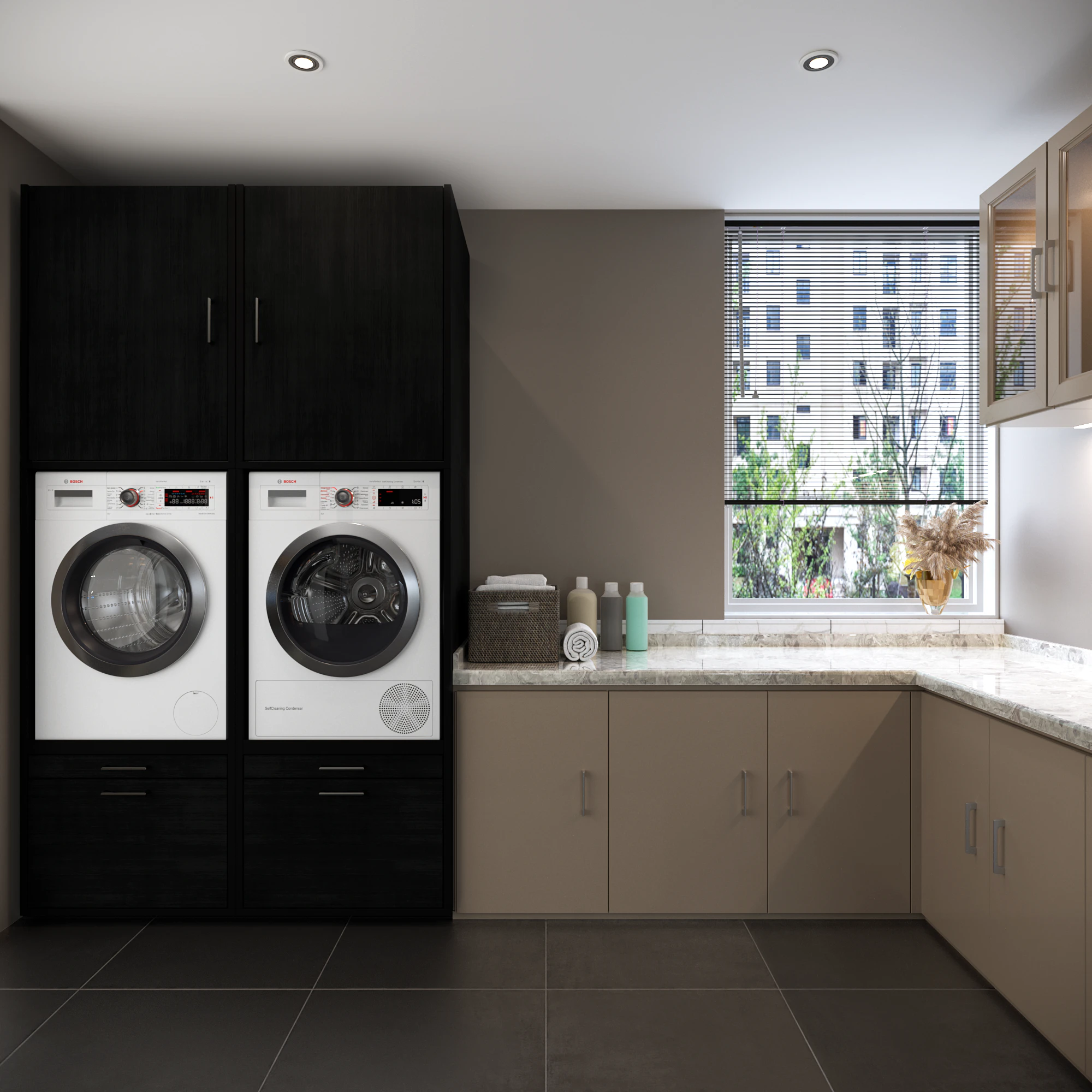 Lifestyle picture of black built in washing machine and dryer cabinet
