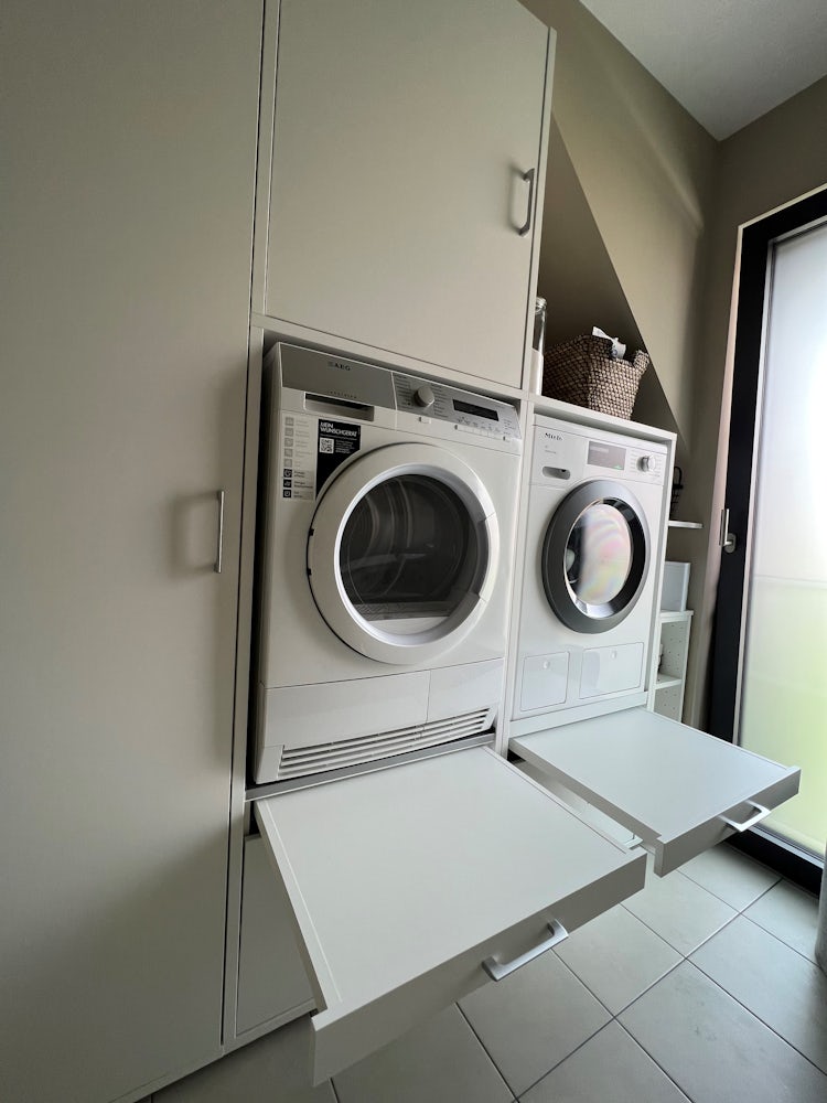 Washtower Washtower's custom washing machine cupboards are perfect for optimizing laundry areas under angled ceilings.