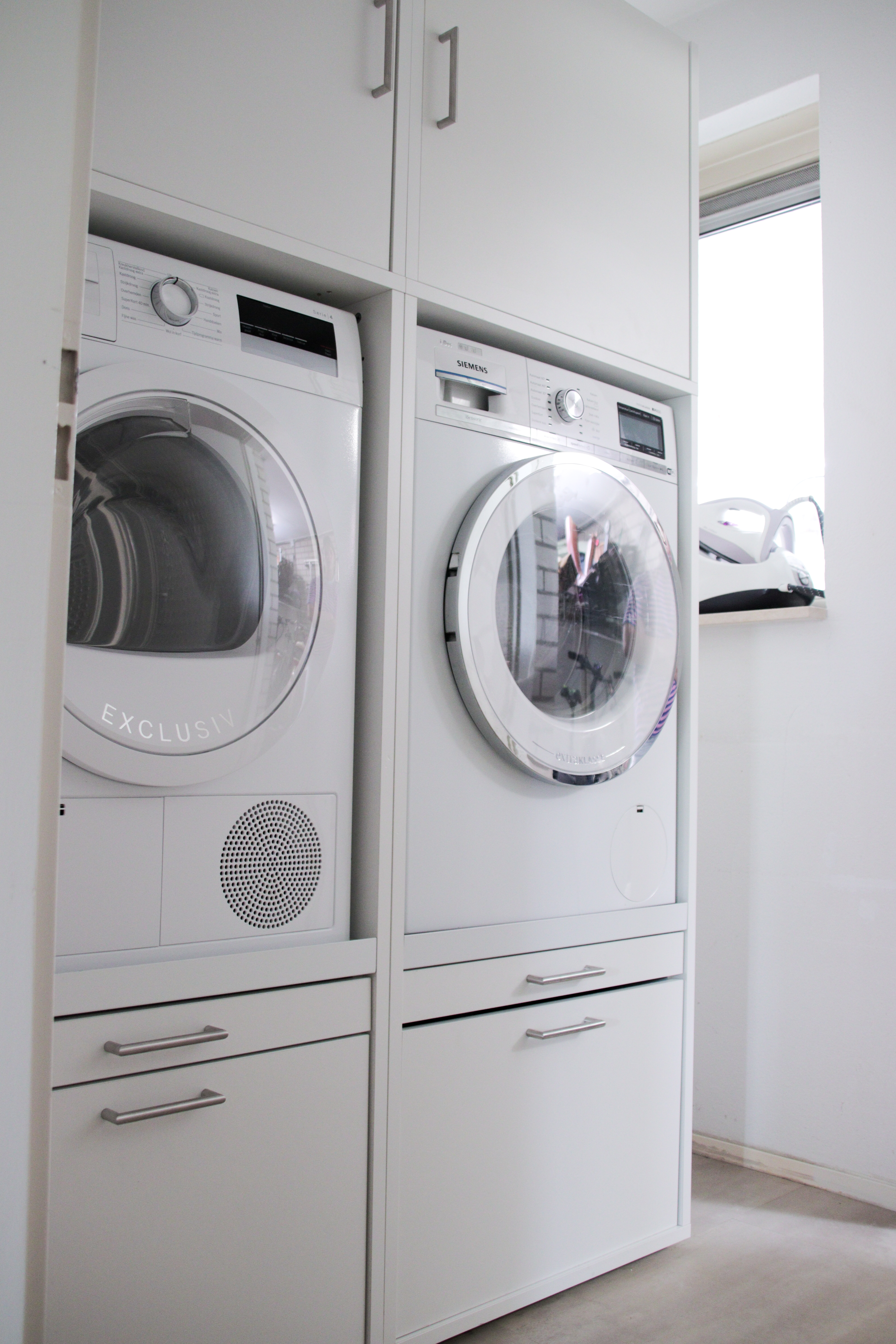 Why do people in the UK typically have their washing machine in the ...
