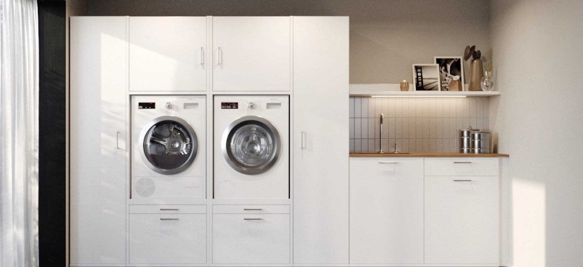 White Washtower® washing machine cabinet in a laundry room