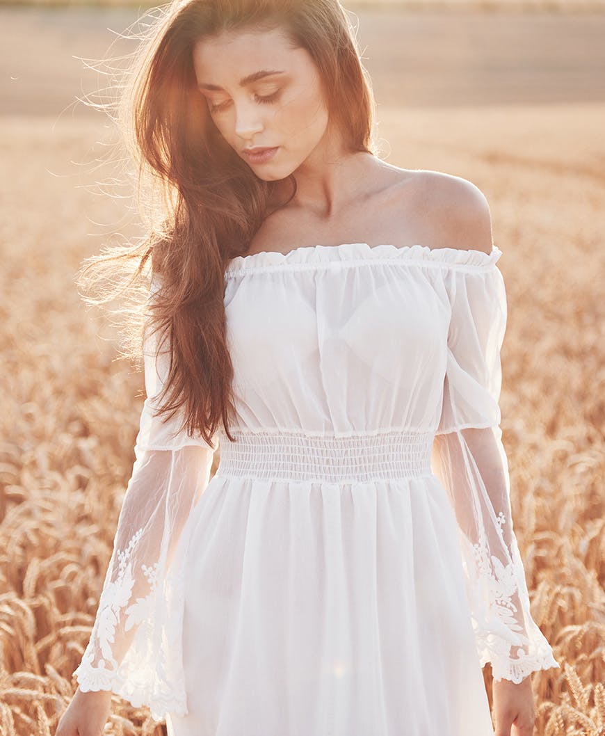 Beautiful Young And Slim Women In White Dress, Walking Through Wheat Fields.