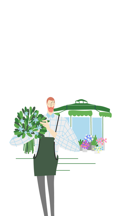 A florist in front of his shop
