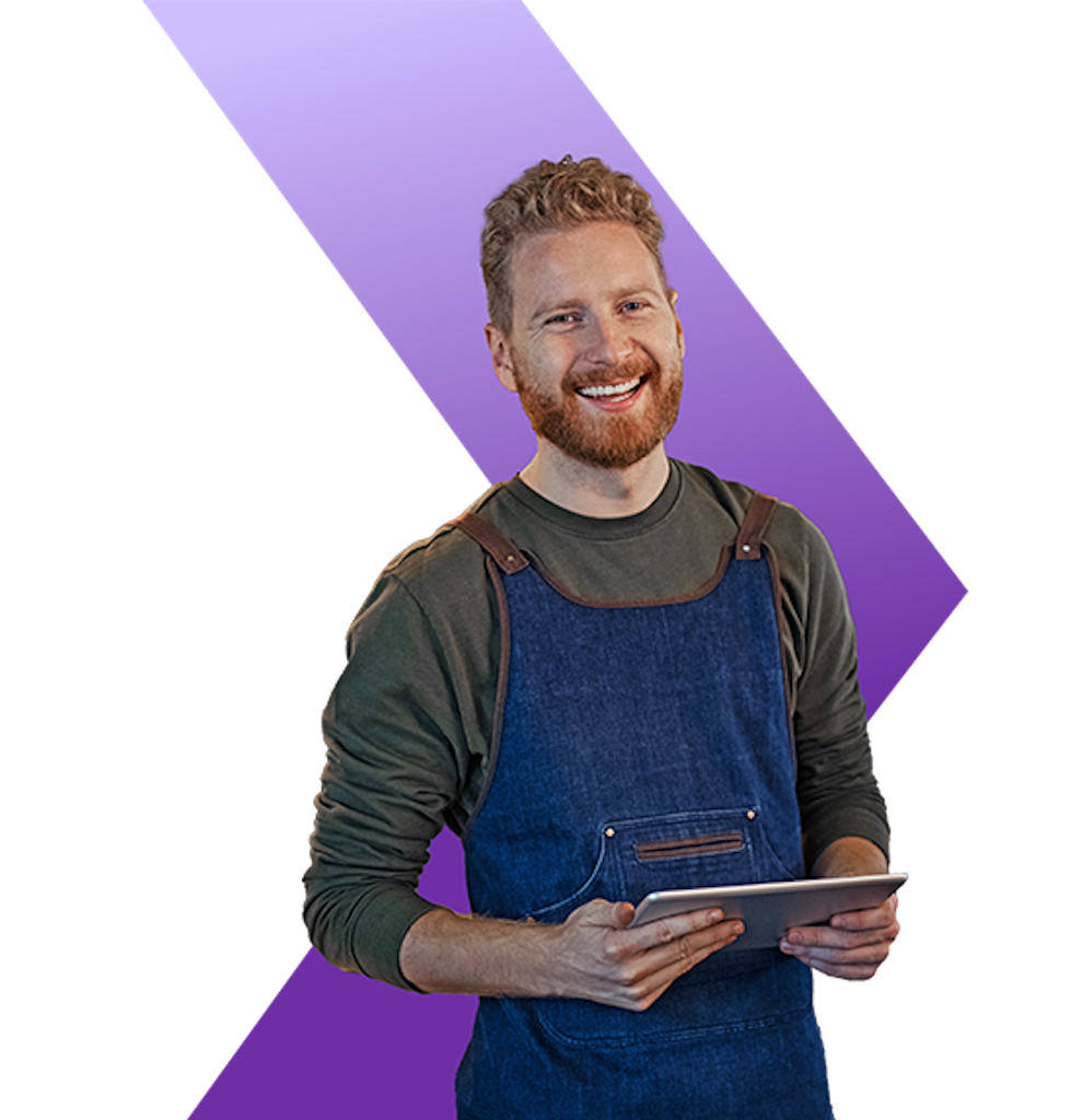 Smiling Entrepreneur Holding a Tablet