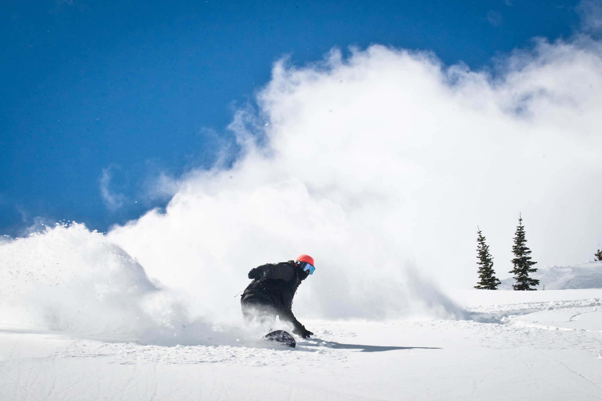 Snowboarding deep powder