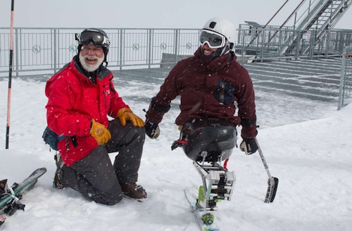 Adaptive skier top of tram