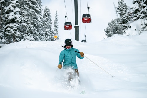 Skiing powder under the gondola