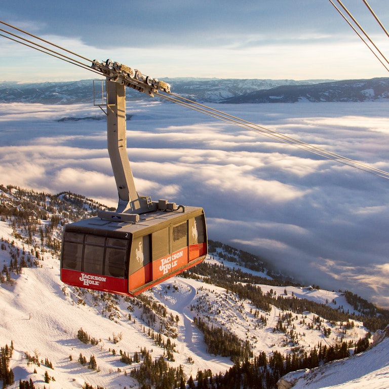 Tram flying above clouds