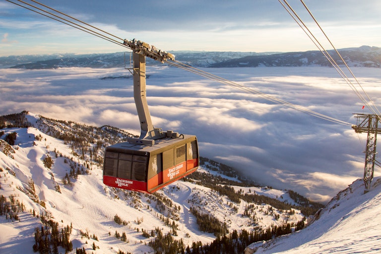 Tram flying above clouds