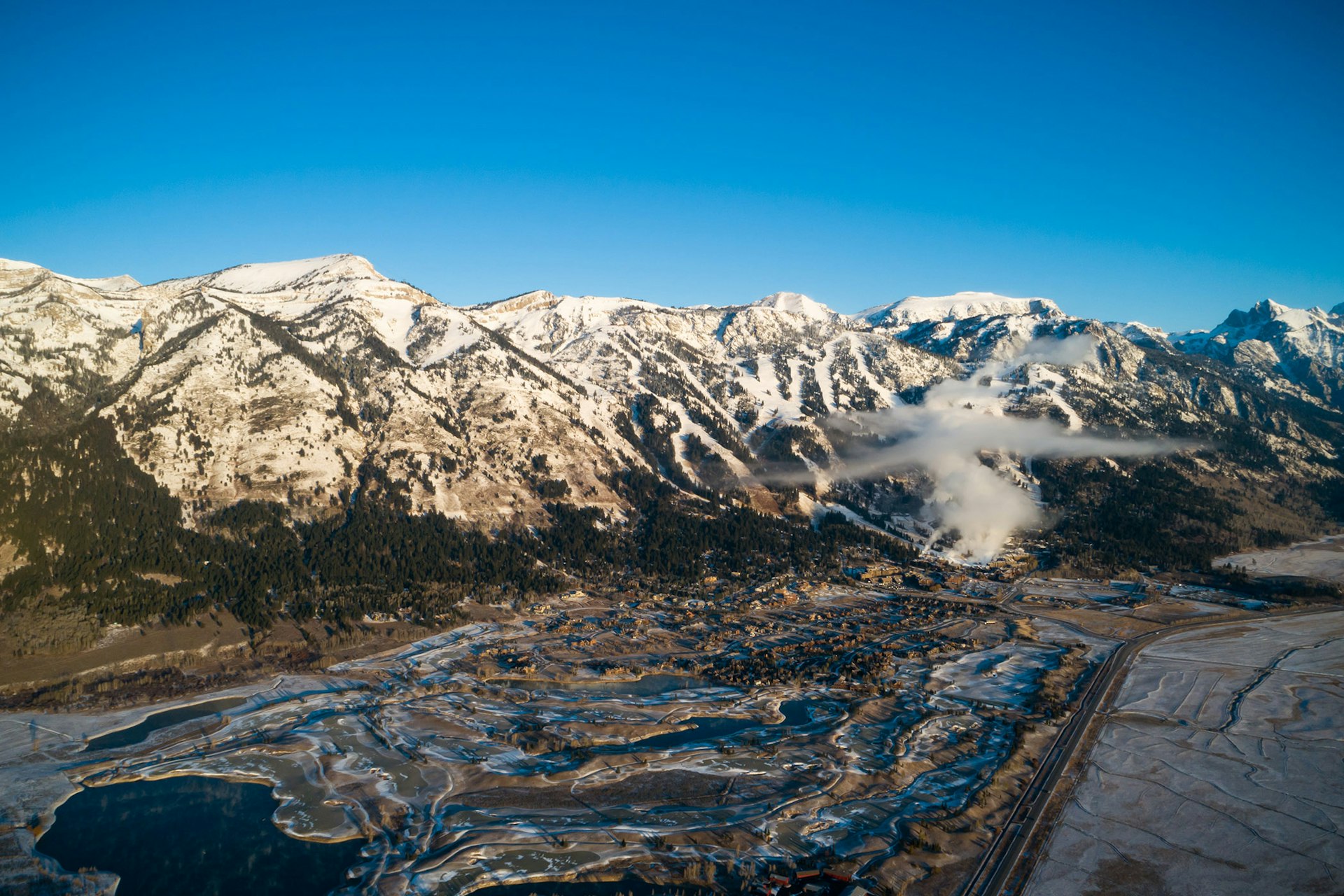 Scenic photo of the teton range and teton village