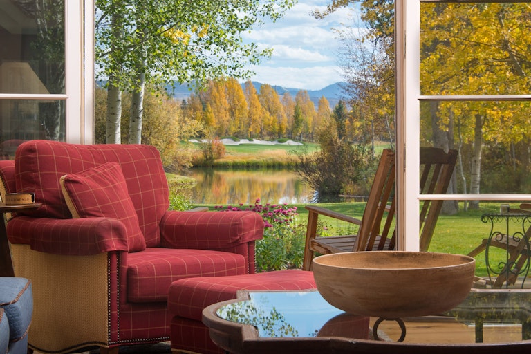 Beautiful living room looking out to a pond