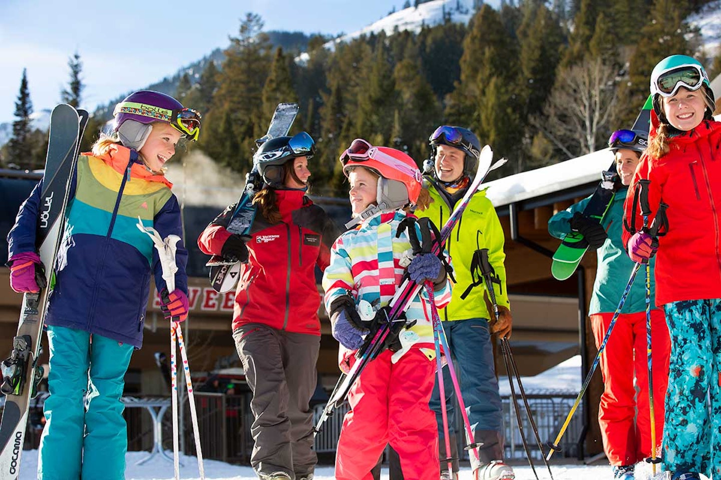 family walking with skis