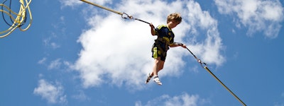 Having a blast flying through the air on the Bungee Trampoline