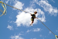 Having a blast flying through the air on the Bungee Trampoline