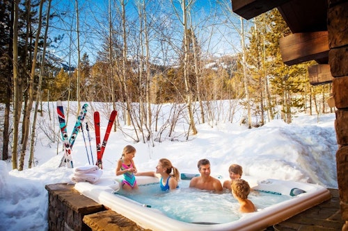Family in Hot Tub during winter