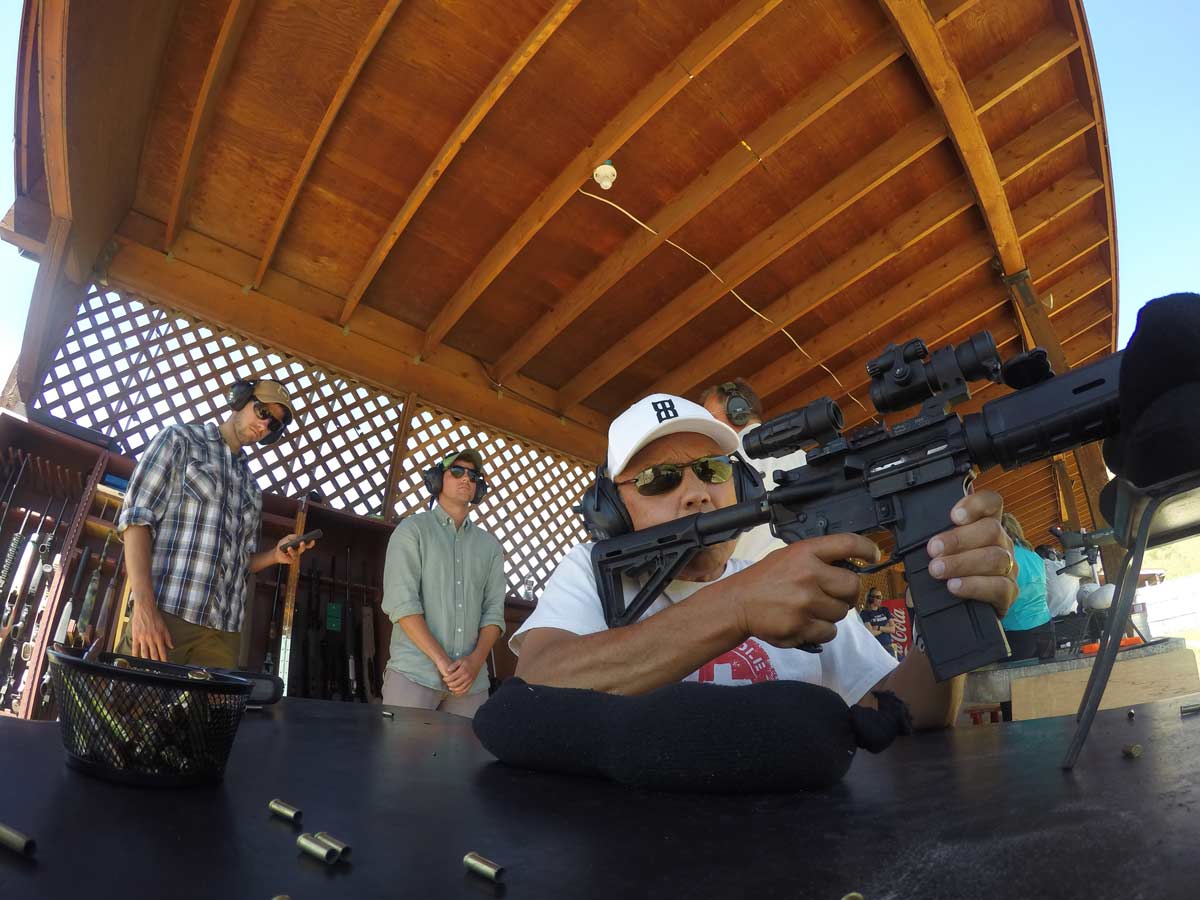 Shooting a gun at a gun range