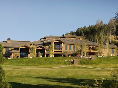 Exterior view of the Grand View Lodges with lush green grass