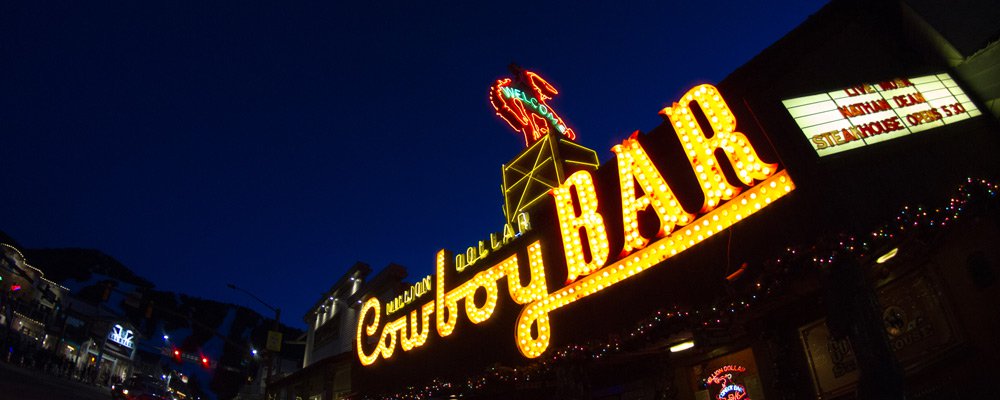 Night shot up the Cowboy Bar sign