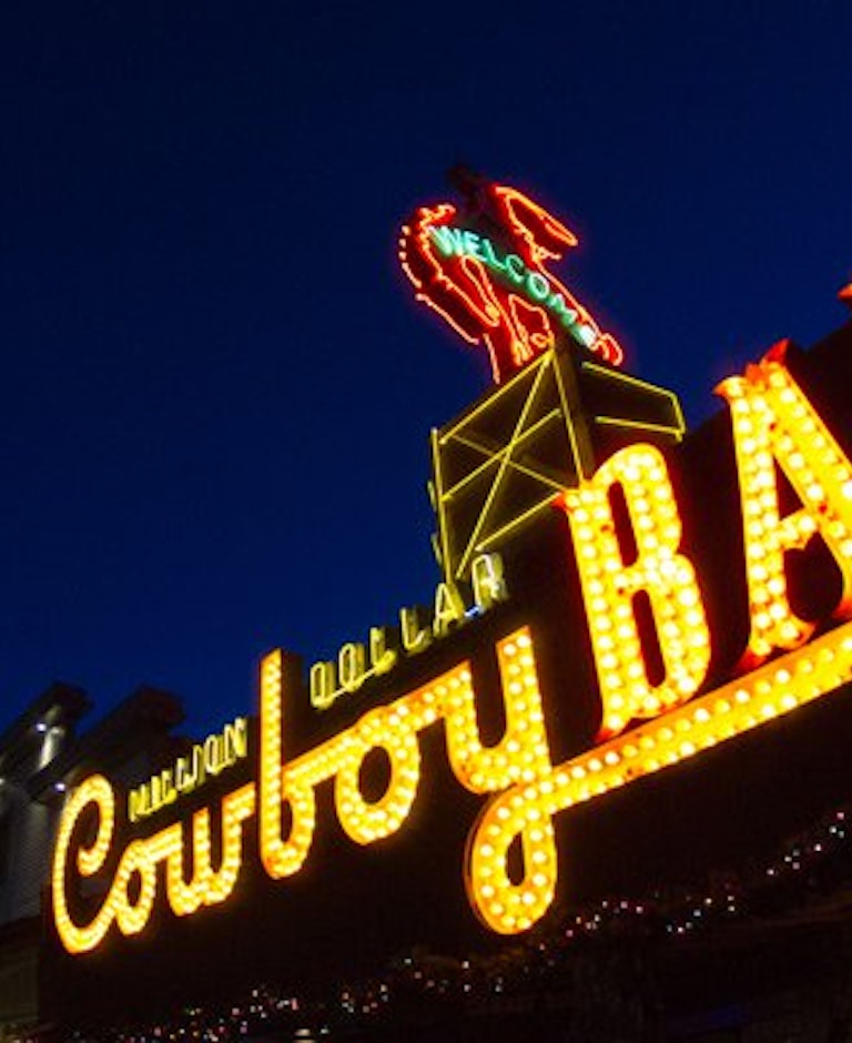 Night shot up the Cowboy Bar sign