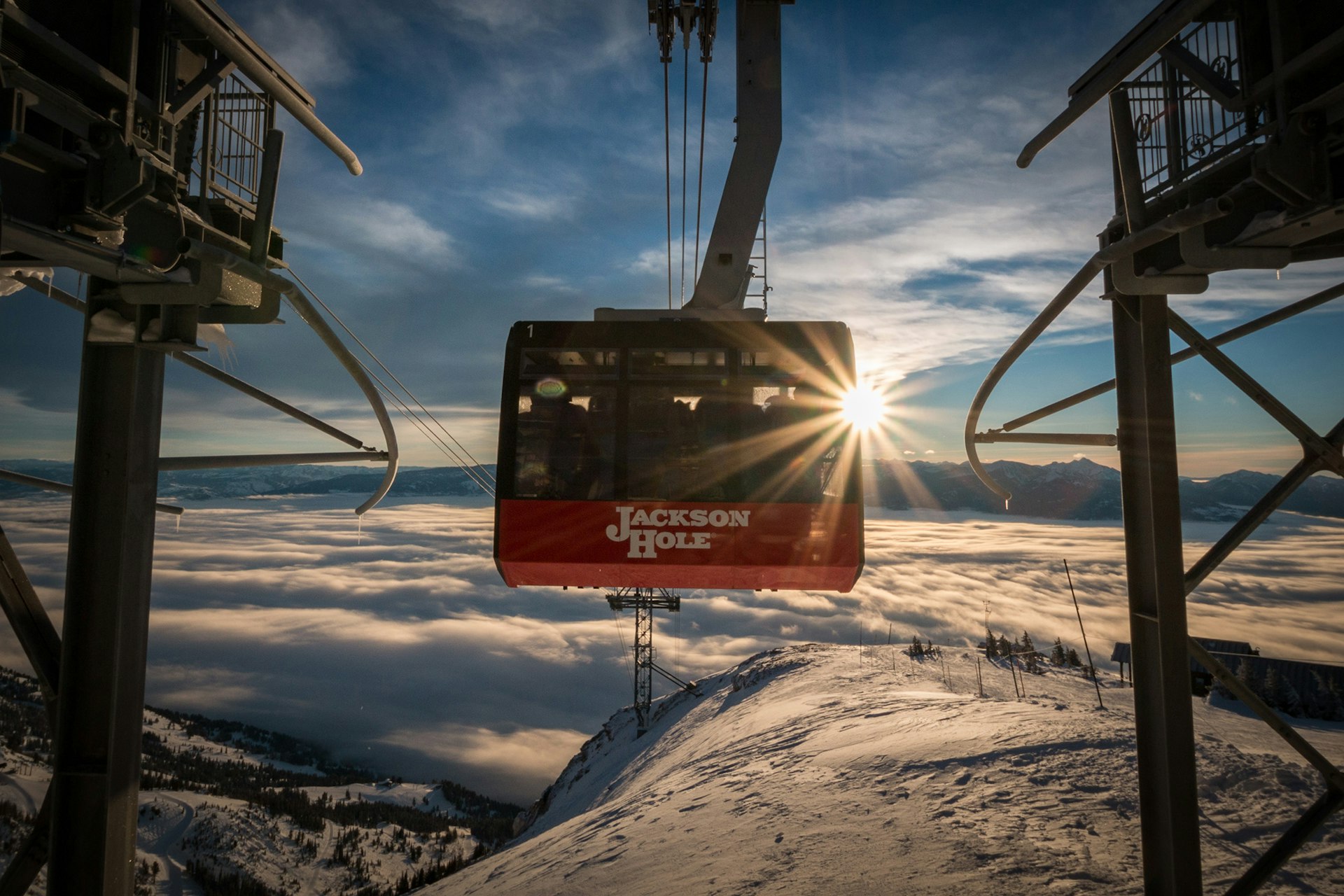 Tram coming into the top terminal with the sun in the background