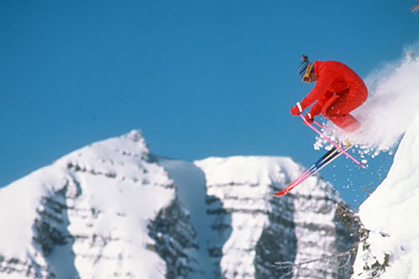 80s skier catching air