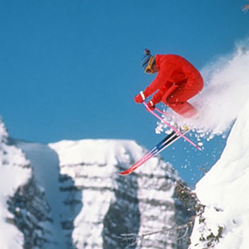 80s skier catching air