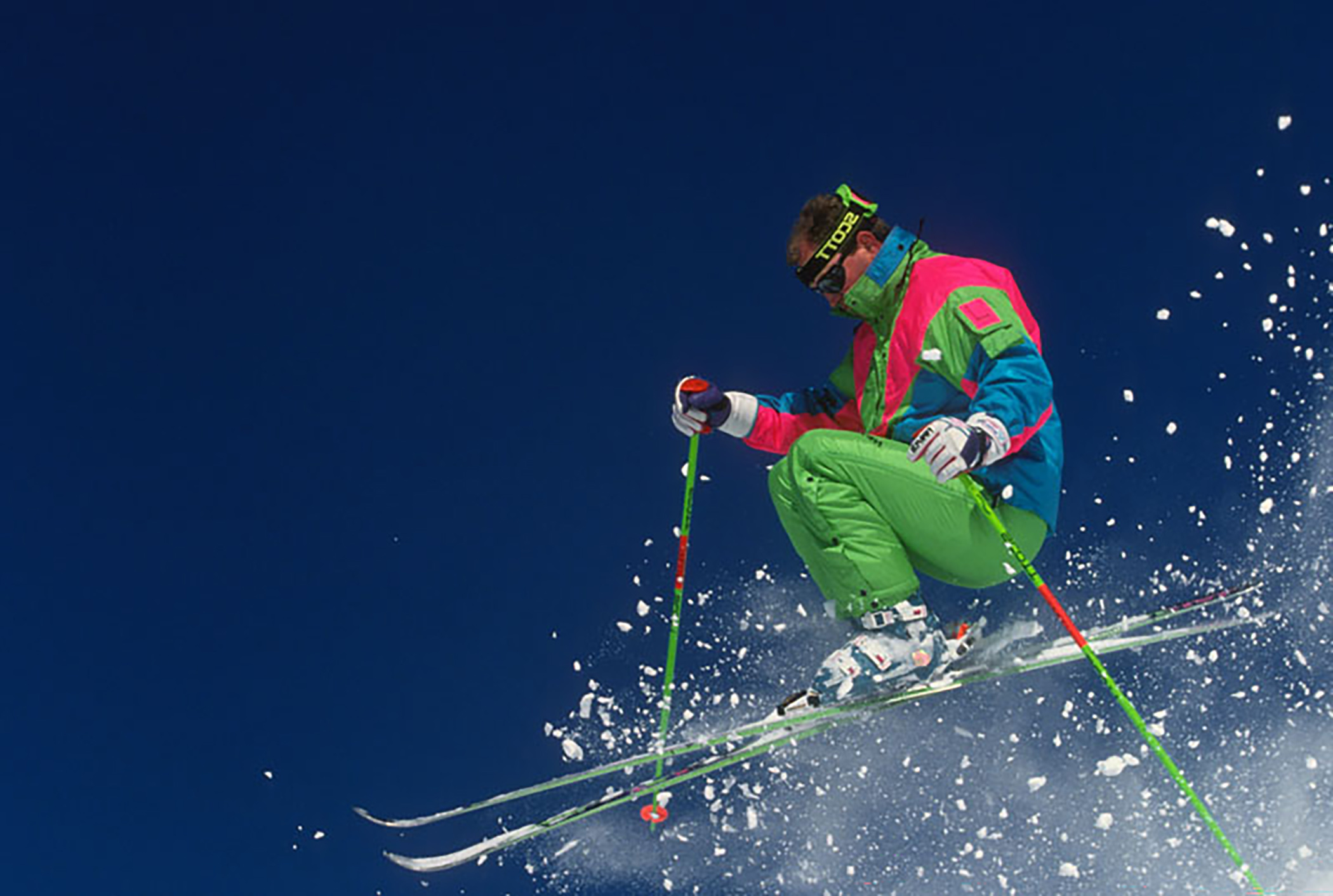 Skier in the nineties getting air
