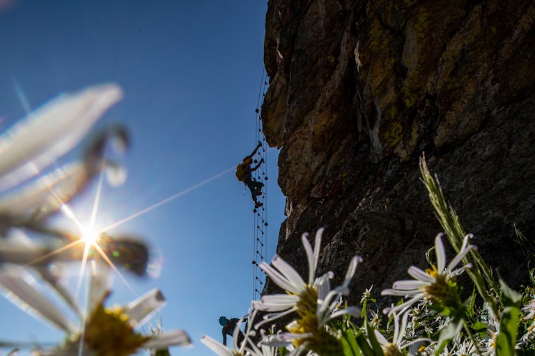 Climbing the ladder on the Via Ferrata